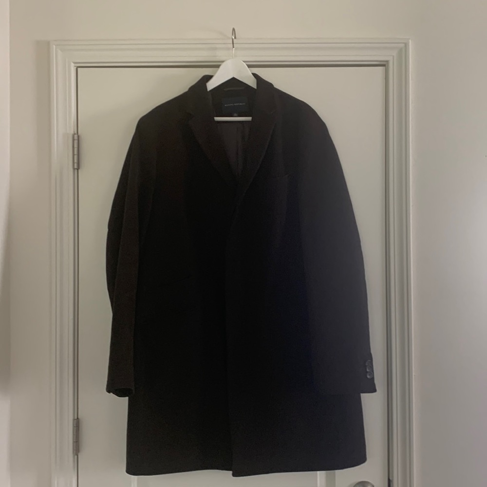 Dark brown, fully lined coat.